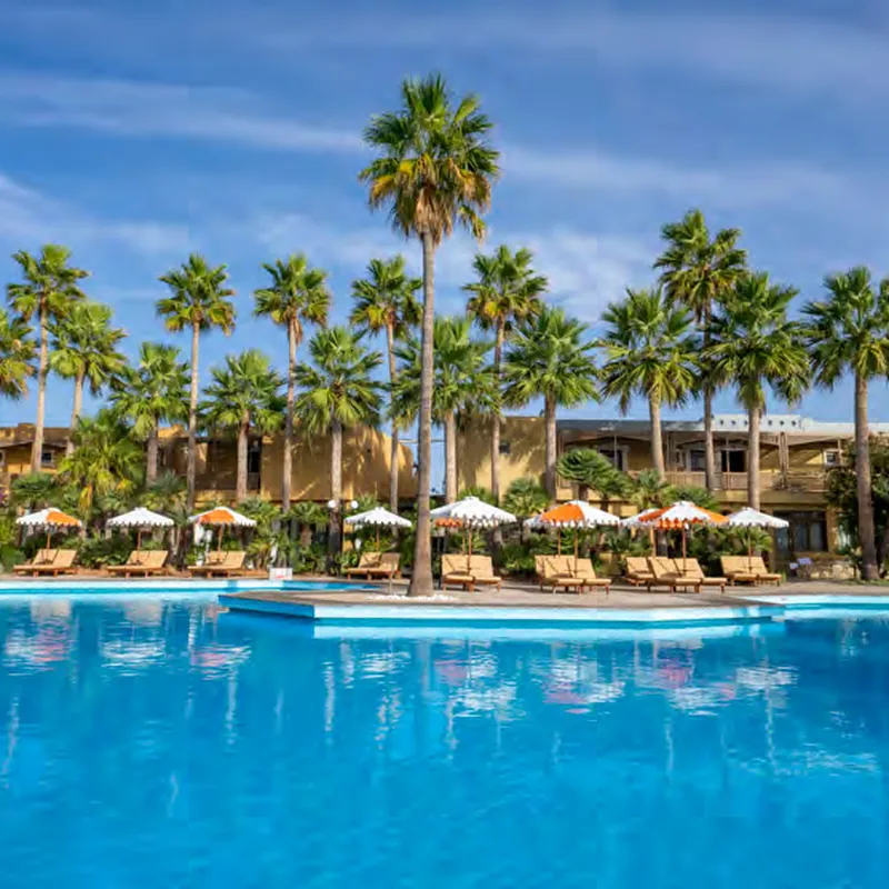 Lush gardens and fountain at the Aquila Rithymna Beach resort