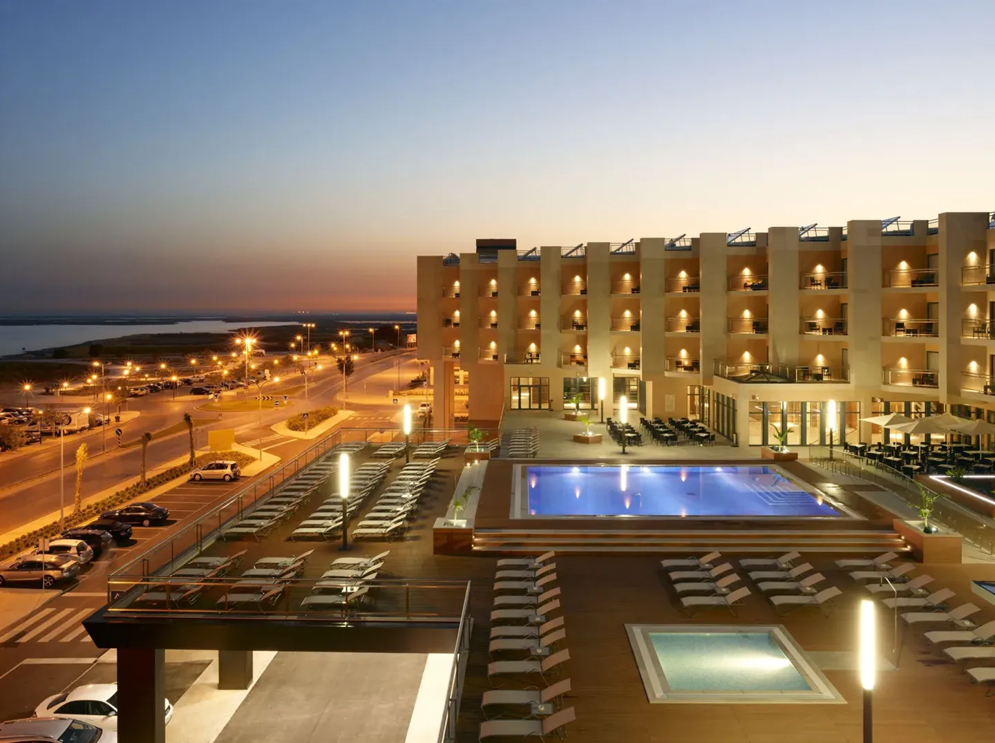 Real Marina Hotel & Spa and its outdoor pool